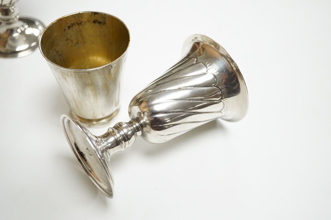 A pair of Turkish? 900 standard white metal goblets, 11.1cm, together with an 800 standard small beaker, 7oz.